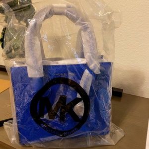 Blue crossbody Michael Kors bag